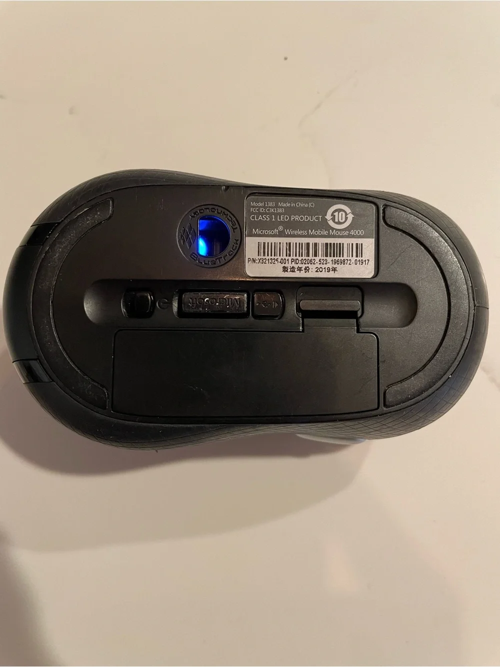 Microsoft Black Wireless Mouse with Green Indicator Light